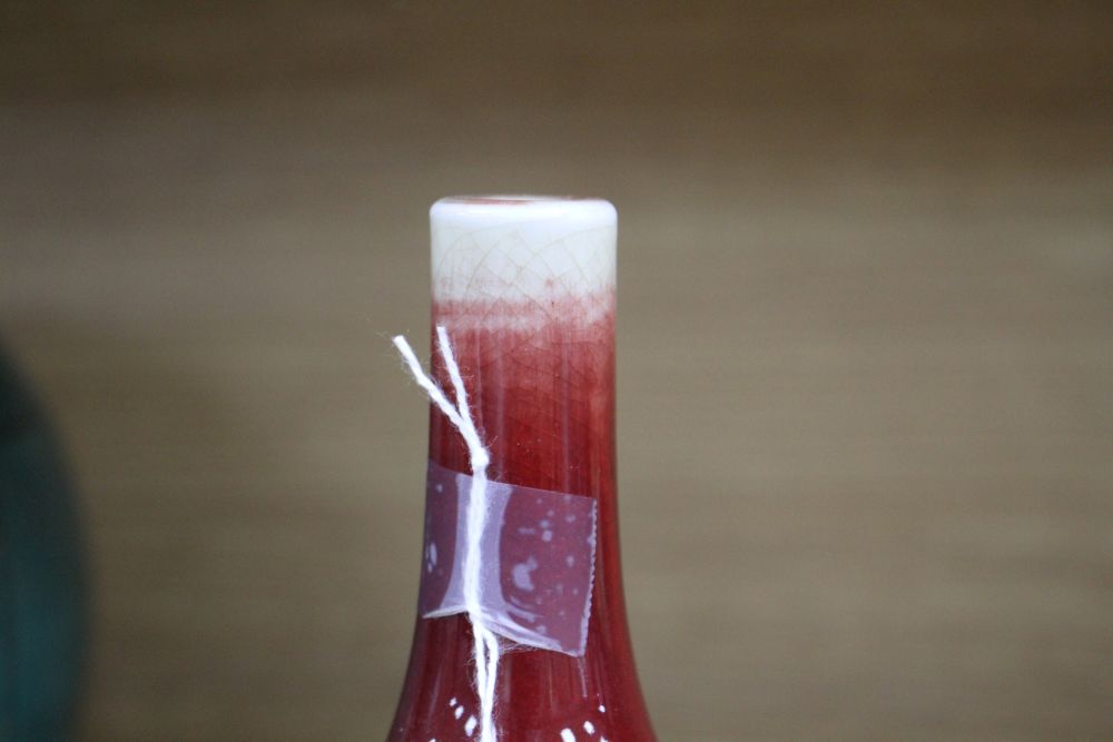 A Chinese sang de boeuf glazed langyao bottle vase, late 19th / early 20th century, H.19cm